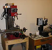 Stand for milling machine? |  Hi,I'm looking to build (or buy) a stand for my X3 mill. The proper ones are...