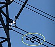 What is this? (power line equipment)  |  Hello,Can somebody help me identify the device marked on this picture: ...