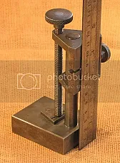 ruler stand question |  Are you sure it is just a ruler stand? If a scriber were attached to themoving...