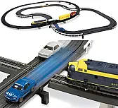 Intersecting Slot Car Plus Train Set Equals Geek Toy  |  The Minic cars weren't really up to having collisions with trains.  MyMinic...