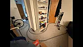 Manual reversing loop turns a passenger train around in an apartment |  When everything is powered up, a two-locomotive Amtrak Coast Starlight, numbered...