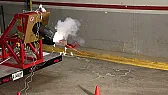Indoor static fire of a composite rocket motor on a custom stand |  The detail that caught me off guard first is the setting: a full static fire,...