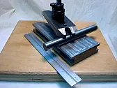 Holding round objects in vise |  I'd put small cylinders in a pin vise, large disks ina four-jaw chuck (I...