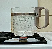 Potable Water - The Third Way.  | http://www.metacafe.com/watch/414997/boiling_using_ice/Joe