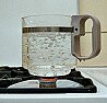 Potable Water - The Third Way.  | http://www.metacafe.com/watch/414997/boiling_using_ice/Joe